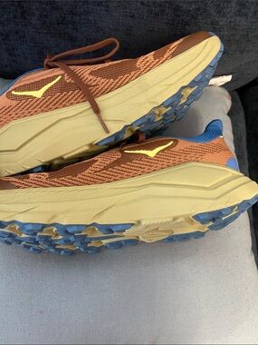 Hoka Men's Brown Tan Running Shoes with Blue Interior. Size 9